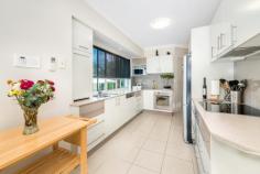 1/28 Birt Avenue, Surfers Paradise QLD 4217 - Superior quality 2 storey solid brick construction - Impressive foyer. Gorgeous casual living/dining area - Open plan entertainer's dream kitchen. Super-storage - Scenic u/cover balcony/bbq area. Views to main river - Ultra-classy formal lounge & dining. Powder room - Master bedroom with spa ensuite & large walk-in robe - + 2 spacious bedrooms/built-in robes. Family bathroom - Large multi-purpose room accessing lovely rear garden - Solid timber floors & staircase. Invisible blinds - Intercom, vacuumaid & security system & screens Flawless design and top quality craftsmanship shine in this thirty square two-storey villa in the picturesque, highly sought-after Budd's Beach area. Prestigiously located it's just a short stroll along the picturesque tree-lined street from the wide main river, boat launching jetty, Budd's Beach Reserve - a favourite water-side park and picnic area - and in convenient proximity to the bustling Surfers Paradise CBD. Visual impact is immediate in the tastefully decorated entry foyer which narrows to an attractive long, light hallway with high ceilings and a pleasing colour palette flowing tranquilly throughout the home. - On the ground level we have a large family bathroom, an excellent laundry/workroom with mega-storage, two spacious bedrooms and, at the end of the corridor, a gorgeous ultra-large air conditioned room with luxurious window treatments, built-ins and benchtop which could serve as a complete teenage retreat, a media room, expansive home office or another living area. Glass doors open to a colourful rear garden and stylish al fresco relaxation. - Upstairs the light-washed living areas are an absolute delight with the family living area spilling out to a scenic balcony and views across to the water - the perfect venue for barbeques or just to relax with a good book and a glass of wine. The adjoining dining area merges with a galley-style gourmet kitchen - a chef's dream - which boasts excellent storage, walk-in pantry and Bosch appliances. Privately positioned next to the kitchen the ultra-spacious formal area combines a sophisticated dining room and lounge, - an impressive venue for special dinners and lavish celebrations. Passing the discretely positioned powder room we continue along to the sumptuous master suite, absolutely resplendent with its large spa ensuite and long walk-in robe. This villa has been meticulously planned and built, incorporating a noise-inhibiting concrete-filled wall, long-life termite-free treatment for the wonderful expanse of solid flooring and stair-casing, the extensive use of invisible blinds providing privacy without obstructing light or views and the abundance of windows sun-soaking the entire home. A beautifully positioned residence of visual superiority, quality and class which will be fully appreciated by the discerning buyer.