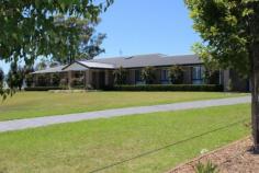 7 Neotsfield Ave, Gloucester NSW 2422 The vendors say sell! Immaculately presented near new home Spacious open plan kitchen dining and living with raked ceiling Separate formal lounge come theatre room 4 bedrooms each with built-ins, main with walk-in robe and ensuite Plantation shutters, ceiling fans and Air conditioned throughout Concrete drive to double garage Situated on an 4050sqm block Surrounded by manicured easy maintenance lawns and gardens Located only minutes from the town centre with fabulous views of the valley Inspection Times Contact agent for details Features Built In Robes Dishwasher Ducted Cooling Ducted Heating Fully Fenced Outdoor Entertaining Remote Garage Reverse Cycle AirCon Land Size 4050 m2
