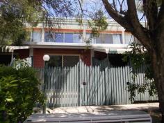 3/61 South Station Road, Booval QLD 4304 Walking distance to the train, buses across the road, all equal convenience. The two bedrooms are a great size with the Master having an air conditioner. Both bedrooms are carpeted with fans and built in cupboards. Exposed beams in the carpeted lounge room and a fan. Storage is sorted with 2 linen cupboards. Single lock up garage. Kitchen is functional with double door pantry cupboard. Rental return $250 a week. Phone to book private viewing.