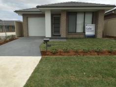 Lot 3 Affleck Garden, Middleton Grange, NSW 2171 Beautifully finished 3 Bedroom single story house with single garage and a list of features all ready to for its new owner. - Three bedrooms - Main bedroom with en suite and walk in robe - Single remote control garage - Ducted air conditioning - LED down lights to living areas - Alarm - Quality tiles to open living areas & alfresco - Carpet to remainder - Vertical blinds - Instantaneous hot water system - Fly screens - Security fly screens on doors - Landscaping & fencing - Clothes line & letterbox - Stone kitchen bench top - Stainless steel kitchen appliances All ready for the new owner in one week!!