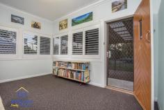 119 Blackwood Rd, Deagon QLD 4017 DELIGHTFULLY MAINTAINED CHARACTER COTTAGE IN A CONVENIENT, CENTRAL LOCATION Sitting comfortably on a wide 784m2 block this comfortable character cottage is just a short walk to transport and the popular Redcliffe to Mitchelton bikeway, and only minutes to schools, cafes and the waterfront – not to mention a direct line of 16km or 20 minutes to the Brisbane CBD. The front veranda invites you to step into this warm, welcoming home. The traditional character of the home with high ceilings, horse hair cornices and quality window treatments is complemented by a contemporary neutral colour scheme. The lounge is serviced by the kitchen and dining area, which leads out onto the expansive fully fenced back yard. it’s a great place to unwind with a BBQ and beers on Friday afternoons as the sun sets. Featuring two bedrooms with a study which could easily be converted to a third bedrooms, the home is comfortable and homey inside with delightful window treatments, but it is the size of the land and the convenient location that sets this property apart. There is potential here to further renovate or expand the existing home, build a granny flat or simply acquire the property as a rental investment and watch it steadily grow in value over time. This an opportunity that will appeal to buyers and developers who can see the potential in the location and generous size and wide dimensions of this block. Central Sandgate is on your doorstep here with schools, train station, parks, lagoon, bars and clubs all within fifteen minutes’ walk, this location offers an unmatched combination of walk-to convenience and relaxed family living in a convenient, urban pocket of Deagon. If you’ve been searching for an affordable, well maintained character home that also offers space and convenience, or a solid rental return, this property will exceed your expectations. For your own private inspection, please call the office now. This opportunity will not last long! Open 7 days Phone 07 3203 6001 (24 Hours)