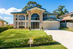 26 Wantana Cres, Edens Landing QLD 4207 If space, privacy & spectacular views are part of your "wish list" then this property is a must see. Situated on arguably one of Eden's Landing's best streets this large Family home offers so much more than fantastic views out over the beautiful Edens Landing landscape. Generous in its proportions this high set architecturally designed brick & tile home has all you need to accommodate that growing family or just to perhaps show off & live the lifestyle. With three good size living areas the home incorporates the perfect blend of formal and informal family living! Its large open plan kitchen has all the features and space required for catering the largest of gatherings or the most intimate of family dinners! This great home also provides three dining areas - large formal area, open plan family and breakfast bar. The homes downstairs also contains a fifth bedroom, large laundry and fully equipped bathroom. The livability of its layout is abundantly clear from the moment you walk through the door. Upstairs there is another large (5.2 x 4 meter) living area, surrounded by architecturally designed floor to ceiling glazing that captures the stunning views of Edens Landing.There are also four good size bedrooms, all complete with air conditioning and built-in wardrobes. The large king sized air-conditioned master bedroom incorporates a huge walk-in robe and a generous en-suite. The homes main bathroom also incorporates a massive bath tub and separate shower. This home is designed to capture the fantastic views and cool Bay breezes. The property's outdoor living area also makes entertaining a breeze with a fully covered & insulated paved entertainment area overlooking the properties large backyard, plenty of room for the kids to play or even the largest of pools. Property Features: - 5 generous sized bedrooms all with air conditioning - Large Open plan kitchen with new appliances - 3 large living areas - Formal and casual dining options - 3 fully equipped bathrooms - Large separate laundry - Double remote lock up garage with internal access and extra storage - Solar power - Fully Insulated ceiling - Insulated Fully covered and paved entertainment area - 2 garden sheds - one 4 x 3meters - Large backyard - Security screens throughout Simple angles, elegant lines and an abundance of windows combine to give the home a spacious feel, whilst also providing a beautiful and practical open plan family feeling that combines both indoor and outdoor living. The orientation of the home also maximizes the use of natural sunlight taking advantage of its Prime elevated position to capture the properties magnificent views and cool Bay breezes defining the concept of modern living whilst staying true to its initial design as a great family home. Eden's Landing offers fantastic family living, plus easy access to transport to both bus and rail, local shopping center's (Woolworths and 20 specialty stores) new Bunnings and Aldi only 2 mins drive and some of the region's best private Schools within close proximity. Priced well to sell fast - with a motivated vendor. This all adds up to be the perfect opportunity to set you up for the future. Don't miss the chance on this one give Alex Stassen a call to arrange a private inspection at your convenience or drop into our open home.