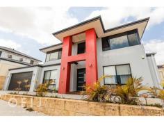 14B Kinsella St, Joondanna WA 6060 DRASTICALLY REDUCED PRICE!! If you are looking for a stylish home with premium finishing’s and with the option of purchasing furnished or unfurnished, then this is the one for you! This beautifully designed home is located in the sought after suburb of Joondanna and includes more than 260sqm of house on a secure block, with striking views from the second floor. Features include a large master bedroom that incorporates a sizeable walk-in robe and ensuite, separate theatre room, activity area, spacious minor bedrooms with built in robes, a second ensuite to bedroom 4 and a garage with an extra storage nook with a side access roller door. This home radiates class and is full of value including polished porcelain tiles, wooden floor boards and a well-designed living area that flows out onto the alfresco area. The kitchen contains stone bench tops with a waterfall edge, stainless steel appliances and a modern colour scheme throughout the house which emphasises the quality of this beautiful home. Contact Michael Laughlin on 0402 851 093 today for a private viewing!