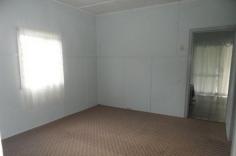 10 Aplin Street Stanthorpe QLD 4380 Easy stroll to Stanthorpe's main street, schools, shop etc - all town services ---set on generous 1012m2 land - low set timber home with 2 bedrooms + sleep out, separate lounge with gas heater, good size dining/kitchen area - there is a combustion stove PLUS electric stove and plenty of good cupboard space too! The bathroom has a separate toilet. There is a covered casual area at the rear - ideal for all year use and more space! The property also has a single lock up garage plus garden shed. Currently there is an excellent long term tenant on a month to month lease but happy to continue if suits an investor! Rental is $210 per week. Great buy on today's market to live in or as investment and a keen seller wants this sold now! So what are you waiting for? Call Anne Lindsay on 0418 737309. Features Smoke Alarms Undercover outdoor area Safety Switch