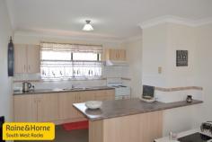 12/10-12 Bruce Field St South West Rocks NSW 2431 Perfection is assured, this beautifully presented two bedroom unit located in a popular complex is only a few minutes walk to all of your shopping needs. Open style living plan with fully paved private rear courtyard, quality inclusions plus lockup garage.