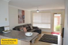 12/10-12 Bruce Field St South West Rocks NSW 2431 Perfection is assured, this beautifully presented two bedroom unit located in a popular complex is only a few minutes walk to all of your shopping needs. Open style living plan with fully paved private rear courtyard, quality inclusions plus lockup garage.