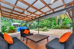 30 Parakeet Pl, Howard Springs NT 0835 THE FEATURES Sizeable family 4-5 bedroom, 2-3 bathroom home on 5 acres of tropical bliss Gated front driveway provides formal entrance Bitumised driveway is high and dry year round Tropical gardens screen the home for ultimate privacy Gorgeous home has roll front verandah Carport parking for 2 plus a built-in dog lock up Verandah spans front of home and wraps around back of home Gorgeous in ground swimming pool with rockery feature Home has enormous living room with separate dining room Central kitchen has breakfast bar plus pantry 3 bedrooms plus study at the front of the home Large master suite enjoys ensuite and walk in robe Main bathroom includes a relaxing bath tub Huge shed has built in office / FULLY SELF CONTAINED FLAT with additional bathroom 2 registered bores and town water Established tropical gardens and rolling green lawns around home Property located 5 minutes from Howard Springs shops Easy access to the Ichthys accommodations 5 minutes from the popular Howard Springs Park 10 minutes from Palmerston CBD THE BENEFITS Located in a quiet area in this supremely popular estate, this established family home has lush tropical gardens and sprawling lawn areas surrounding a home that requires naught – simply move in and enjoy it as much as the current owners do. The home is extremely well looked after by proud owners who tend to its every need. Inside is an expansive open living room with tiled flooring, glass fronted French Doors that open onto the verandahs that wrap around 3 sides of the home offering bountiful entertaining space under its shaded roof. Back inside, the home has a central kitchen with two-way access to both the dining and living rooms. The kitchen also includes a large pantry, great storage and prep space, a dishwasher plus a breakfast bar as well as quality appliances throughout. The home offers 4 bedrooms that each have A/C and a built-in robe along with large windows that frame the tropical greenery from outside. The master also enjoys a walk-in robe and en-suite amenities plus there is a study or small 5th bedroom option as well. Endless hours will be spent splashing in this tropical oasis with a large in ground swimming pool nestled at the base of tall palms. The area has a large paved portion where you can entertain under the stars or sunbake while the kids splash about. Also on the property is an enormous workshop shed with a built-in office or granny flat and bathroom amenities, additional verandah area plus RWT and a side parking bay as well. Located a short 5 minute drive from the popular Howard Springs Park and the shops, the home is also under 10 minutes from Palmerston CBD making it the ultimate rural retreat without compromising on your everyday necessities. THIS PROPERTY HAS BEEN PRICED BY A BANK VALUATION TO PROVIDE ACCURATE AND COMPETITIVE VALUE TO YOU THE BUYER. Book your private inspection today.