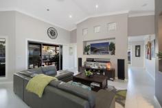 3 Lakeside Dr, Casino NSW 2470 THE LUXURY LIFESTYLE YOU DESERVE Extraordinary open plan lifestyle all coming together to create a relaxing yet dynamic family entertainer in an unrivaled position. Thoughtfully designed and equipped, this ideal architect designed 42sq home is appointed with many unique features and room for everyone! -5 generous size bedrooms plus office, built-ins, main bedroom with walk in robe. -Sleek ultra modern main bathroom plus designer ensuite with spa bath. -Chic open living, kitchen and dining areas with built-in wall fish aquarium, raised ceilings. -Ducted reverse cycle air conditioning throughout plus separate games room. -State of the art sound proof cinema room with built-in surround sound. -Outstanding chefs kitchen with high end cabinetry, over sized stone bench tops, glass splash back, soft close draws, large pantry and quality appliances. -Indoor flows effortlessly to private outdoor living overlooking 8m x 6m swimming pool. -Extra large garage with remote door and workshop/storage area. -7 metre x 6.7 metre colour bond shed with power, doubles gates to backyard. -Also include the finest quality floor tiles, insulated ceiling and walls and double hung windows to complete the package. This exclusive and immaculately presented home is ready for your family to move straight in!! Contact Trent Savins on 0403 624 193 to arrange your inspection today. Features Built-In Wardrobes Ducted Cooling Ducted Heating Ensuite Fully Fenced Outdoor Entertaining Pool - Inground Remote Garage Rumpus Room Shed Spa - Inside Study