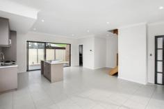 16 Lauren Ln, Sunshine West VIC 3020 First home buyers take advantage of recent changes to stamp duty measures. *Copy and paste the below link for more information* http://www.sro.vic.gov.au/news/changes-first-home-owner-grant-and-stamp-duty Located in a sought after pocket of Sunshine West this beautifully designed home defines modern living in an established location with easy access to Western Ring Road. Boasting its own street frontage and driveway with no body corporate fees this quality built home will suit townhouse buyers and investors. Offering 3 bedrooms with BIR – en suite/WIR to master, central bathroom, 3 toilets, study nook, open plan living/dining, modern kitchen with island bench top and gas appliances and lockup garage with remote roller door. Additional features include: 4 x split system heating/cooling units, alarm system, private courtyard, Tasmanian Oak staircase and 9ft ceilings to ground floor. An ideal opportunity to secure a safe investment or stylish home conveniently located on the door step of a busy shopping strip, schools, parks and bus stops.