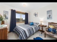 2/49 Bay Road, New Town TAS 7008 This sunny and spacious 2 bedroom villa unit is ideal for the investor, down-sizer, first home buyer or young professional couple; nestled in the sought after suburb of New Town, and with easy access to buses and the cycleway you will find yourself in a very convenient location for those needing to commute to the city on a regular basis. The combined lounge and dining areas lead off from the timber panelled galley kitchen, then through a sliding door step into the very private and low maintenance Alfresco area out back; great for entertaining family and friends on the weekends or warm summer evenings! Down the hallway, there are two double bedrooms (the main bedroom x-large) both with built-ins, then a generous bathroom with separate shower and bath, and separate toilet, and let's not forget about all the extra storage throughout! Continuing down the hall and through the internal access there is a very large single lock up garage with remote control; experience the pleasure of transitioning from car to home without ever getting wet! There is more storage cupboards here and room for a work bench, plus an extra off street car space outside! Around the front of the home is a very sunny veranda which can be used all year round to relax on, or if you were looking for a little more fun…you are within walking distance to North Hobart's entertainment precinct, several sports grounds, and Cornelian Bay. This lovely villa unit will suit anyone looking for a central location, whether young or old; with its low maintenance appeal and proximity to the city centre, you really don't want to miss out on this one!! Call Angela today for a private inspection!