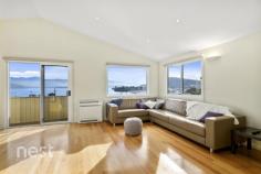 2/37 Kaoota Road, Rose Bay, TAS 7015 Cleverly positioned to enjoy all of the views that Hobart is famous for this beautiful 3-4 bedroom and 2 bath strata developed home is just what you've been looking for. Energy efficient in design and boasting a large living area and 2 private sundecks you will be instantaneously whisked away to your happy place upon entry. Parking is plentiful with 2 spaces off street and a secure single garage with internal access. Through this internal access you rise to the main level of the home that has glorious polished hardwood flooring and accommodates the main bedroom and living, kitchen and dining area. The social area of the home has abundant sunlight and the open plan nature allows generous floor space to accommodate a joyful family life. The kitchen is well appointed with modern European appliances and is positioned to enjoy ever-changing views of Mt Wellington, The River Derwent and the nearby Lindisfarne Foreshore. The main bedroom is huge and has a substantially sized walk in robe and lovely ensuite. All bedrooms have been appointed with hardwearing wool carpets and allow sunlight to enter at different moments of the day. On the lower level there are queen sized bedrooms both with built in wardrobes and both with their own private access to the secure back yard and under deck patio. The main bathroom on this level has bath, shower, vanity and toilet and a third separate toilet can also be found on the ground floor. A smaller 4th bedroom or study is a bonus thus providing a great space to be utilised for many things. Finishing off this level is the internal laundry, two linen cupboards and under house storage. This home is warm, inviting and comfortable. It is situated within easy 5 minute commute to the CBD and provides and aspect and vista that most people can only dream on. Built to accommodate family living it is as equally suited to a retiree or investor and we welcome your enquiry to allow inspection for your own opinion. , NBN connected , Induction cooktop , Double Glazed Windows and Doors , Private Position , Daikin heat pump , Foam Cladding enhancing the energy efficient nature of design
