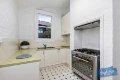 147 Wellington St, Flemington VIC 3031 Traditional character, complete comfort and a sunny courtyard backdrop lead the long list of attractions associated with this enticing Victorian terrace. The polished floors and high period ceiling of a classical entrance hall introduce two double bedrooms, each enhanced by original fire-places. A central living/dining area catches northern natural light and features its own polished floors, period fire-place and a Rinnai gas heater. Light filled renovated bathroom with laundry facilities. To the rear, a bright separate kitchen is beautifully presented and opens to a rear courtyard complemented by the natural advantage of north westerly aspects. Rear right-of-way provides the option to introduce off street parking if so desired. Mt Alexander Road trams, Flemington shops and the CBD all within conveniently easy reach.