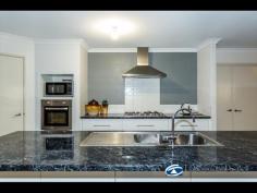 21 Greenacre St, Pinjarra WA 6208 Its amazing how much house you can fit on a modern day block. A 7 years young Ventura built home that has 4 good sized bedrooms, 2 bathrooms, open plan living and a true theatre on 500m2 of land just to cover the basics. From there the master bedroom alone could count for 2 rooms so Mum and Dad can have their own retreat and bedroom all in one, even the en-suite has 3 shower heads just in case you need that extra choice to enhance your daily routine! The kitchen and living areas are light and bright courtesy of the tiled floors and the open plan really works to give a great flow to the extended alfresco area and low maintenance yards. It really is a home that has been built with some thought involved, the space is here, the fittings are here, so it is just a matter who gets what room!