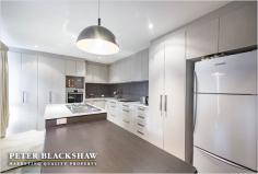 18 Cornish Pl, Holder ACT 2611 An outstanding opportunity is now available for you to secure a separately titled Willemsen designed townhouse which is superbly located at the end of a quiet cul de sac backing reserve. Boasting a unique split level floor plan that offers sun drenched living areas with the extensive use of high raked ceilings and floor to ceiling windows. The split-level dining and living area gives a sense of spaciousness, whilst the modern kitchen with island bench over looks the private front courtyard. On the lower level, the master bedroom comes complete with a walk-in wardrobe and ensuite, while the two remaining bedrooms, study and bathroom are located on the first floor. Both the front and rear secure private courtyards are ideal for entertaining family and friends. Within a short stroll to the local shops, Cooleman Court, public transport and local schools makes this centrally located townhouse an ideal investment or live opportunity. Features Include: Separate title three bedroom townhouse Approximately 120m2 of living space Willemsen design split-level floor plan Full-height windows in most rooms allowing an abundance of natural light Renovated kitchen with island bench top Three bedrooms, segregated master with ensuite and walk in robe Generous study area Gas heating and split-system air conditioning Electric hot water Backing reserve Easy-care secure front and rear courtyards Double carport (with storage room) Quiet cul-de-sac location close to schools, public transport and local shops