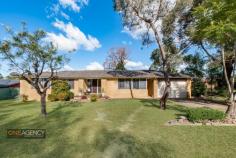 1 Judith Ave, Mount Riverview NSW 2774 This lovely brick and tile home is perfectly poised to offer a convenient lifestyle. Comprising of 3 sun filled bedrooms, polished timber floors and a great size lounge/dining room. The layout is clever and offers three bedrooms, all with built-in robes and ceiling fans. The stunning new kitchen with stone bench tops, soft close drawers, European appliances and gas cooking overlooks the backyard and cleverly hidden laundry. The home offers split system air conditioning for year round comfort while the bathroom and separate toilet are modern and perfectly presented. The property is on a large (863sqm approx) cnr block with a fully fenced yard and large deck, which is accessed via the kitchen. With polished floor boards, newly laid carpets in the bedrooms and freshly painted interiors this home is immediately inviting. This home is on a highly sought after near level block > 3 bedrooms, all with built in robes, ceiling fans and flawless presentation > Stunning new gourmet Kitchen with waterfall edging leading onto large deck > Split system air-conditioning, and impeccable standards throughout > Large (863sqm approx), low maintenance flat yard > Ample yard to enjoy, with plenty of grassed space & oversized lock up garage > Close Proximity to local shops, schools and day care centre