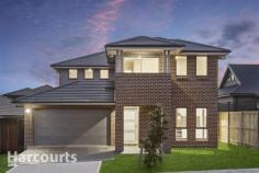 17 Mckeown Street Oran Park NSW 2570 Located in the sort after suburb of Oran Park is this brand new two storey Eden Brae home. Boasting four bedrooms in the main section of the property and also featuring a single bedroom attached granny flat ensures this property is ideal for the buyer looking for in-law accommodation, a supplementary income to rent out part of the home or perfect for the more mature buyer with older children. - Brand new four bedroom contemporary double storey Eden Brae home. - One bedroom attached granny flat with own lockable access. - Master bedroom featuring walk in robe and ensuite with balcony. - Additional three carpeted bedrooms all with built-ins. - Stylish Contemporary tiling throughout traffic areas, carpeted bedrooms and lounge. - Elegant kitchen, offering Smeg 900 mm stainless gas cooking and stone bench tops. - Smeg stainless dishwasher, breakfast bar and generous fridge space. - Separate laundry with external access to side of the home. - Alfresco area, built as a part of the home over looking low maintenance rear yard. - Open living area with combined living and dining room also with separate media or lounge. - Ducted Air Conditioning, alarm system, with gas bayonet fitting for heating. - Remote double garage with internal access and security intercom. - Only minutes away from childcare's, school's and the Oran Park Shops
