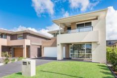 9A Elsdon Street Redhead NSW 2290 This brand new custom built residence offers contemporary interiors, sun-drenched outdoor entertaining space with large level lawns and captures the essence of beachside living. Located in the ever-popular beachside location of Redhead and designed with an eye for detail and wow factor this four-bedroom home is positioned on a sunny block with impressive street frontage and auto-double garage. + Streamlined open living/dining space bathed in natural light, opens to alfresco dining area and large level lawns and garden + Sleek stone kitchen with quality integrated appliances, glass window splashbacks + Upper level offers 4 large bedrooms with built-ins and large rumpus room + Oversized master bedroom, walk-in robe and en-suite with double vanity & double sized shower + 2nd bedroom with balcony, multi purpose room (possible 5th bedroom), large laundry area + Large auto-double garage with internal access, security alarm, low maintenance living at its best + Insulated for noise and weather, reverse cycle air conditioning throughout with 3 zoned areas + Moments from Redhead beach coast line, local shops, child-friendly parks and breathtaking bush walks