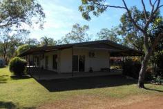 105 Brahminy Rd, Humpty Doo NT 0836 Situated 5 minutes from Humpty Doo shops and schools, this approx. 5 acre lifestyle property has something for everyone in the family. This 3 bedroom/2 bathroom home is fully tiled throughout and features an open plan kitchen, dining and living area, has split system air-conditioning throughout and has been freshly painted. The main bedroom and ensuite are situated at the opposite end of the home to the other two bedrooms. Wrap around veranda's ensure the home stays cool with the back veranda extra wide for entertaining guests whilst the children swim in the pool. A shed is situated to the side of the property and has ample room for the toys with the addition of an awning to put the boat under. The block is fully boundary fenced with an internal paddock and stables with power, lights, fans and a tack room. Features: • Solid 3 bedroom – 2 bathroom home with wrap around veranda's • Approved plans available for an additional living area and bedroom. • Entertaining area overlooking independently fenced pool • Air-conditioning throughout with built in wardrobes • Carport, Shed, • Sand arena with stable and tack room + 2 internal paddocks • Irrigated gardens surround the home • Conveniently located close to shops, schools, medical facilities and tavern