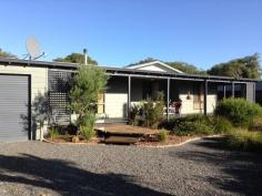10 Jarrah Rd, Walpole WA 6398 This home is close to all town amenities and adjacent to the Bibbulmun Track and Mundabiddi Trail– enjoy a short stroll or cycle to town and the Inlet. The main house consists of 3 bedrooms, 1 bathroom, 1 WC and is open plan living. There’s a lovely NW-facing sunroom. 1 garage, a workshop in rear of yard and there’s room for a caravan. Lawn-free, low-maintenance landscaped gardens. PLUS Fully Self-Contained Unit This 900m2 property also includes this detached 1 bedroom 60m2 unit with verandah– ideal for a home business or studio ( let the kids enjoy the great school in Walpole). Also suitable for a holiday rental, dependant parent or friend/family stays.