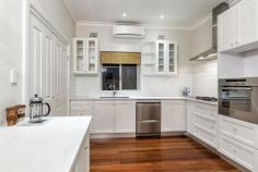 91 Gardner St, Como WA 6152 OPEN THURSDAY 28TH SEPTEMBER AT 6:00 - 6:30 PM In an era and an area where blocks are getting smaller and privacy is at a premium, this sprawling 959m2 North-facing allotment boasts an inviting 15m+ frontage and is presently zoned R15/25, making it a potential duplex site and underpinning the current and future value. Decades of renovating experience and meticulous attention to detail have come together in perfect harmony during the loving restoration of this quintessential character home, where a marriage of period features and contemporary finishes have produced the ultimate family abode. The charming facade of this Circa 1940-built brick and tile residence will do little to prepare you for the substance and style that awaits inside. Solid timber floors greet you at the front door and a wide entrance hall, typical of the era, invites you further into this immaculate home. Multiple living areas and bedrooms of generous proportions will accommodate almost every family dynamic, and a separate fully self-contained studio at the rear of the home provides a retreat for teenagers, in-laws or inveterate guests. The magnificent designer kitchen is a centrepiece, boasting stone bench tops, European appliances, soft-close cabinetry, ample storage and preparation space, and a breakfast bar. Outside, the home will surprise and delight you. Expansive manicured gardens and a sparkling below ground pool make this the perfect place for your children and your pets to play, and a large undercover alfresco area is an enviable entertaining space. There are insufficient superlatives to describe the way this one-of-a-kind family home makes you feel, and the emotions it will evoke. Now that the all of the hard work has been done, all that remains is for lasting memories to be made. PROPERTY FEATURES: 1. Reverse - cycle air conditioning 2. Double lock-up garaging and ample off-street parking 3. Security alarm 4. Reticulated gardens 5. Prime Como Beach location, right on the South Perth border $1.5M - $1.6M