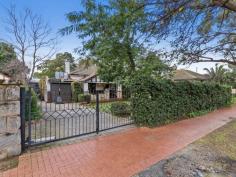 22 Market St, Guildford WA 6055 $830,000 Simply gorgeous (circa 1932) 5 x 2 brick & tile Art Deco home in walking distance to the SWAN RIVER, the Café strip, pubs, restaurants, transport, the exclusive Guildford Grammar School and only minutes from the airport & all the treats on offer in the Swan Valley. Boasting: • High brick wall with electronic gates • Attractive front gardens with timber deck & seating area • Wide veranda – that perfect spot to relax • Impressive entrance with attractive Art Deco wall lights • Formal lounge with fireplace, ornate ceiling, stunning lead light window, French doors & Art Deco light fixtures • Dining room with ornate panelled ceiling, unique light fitting & lead light French doors • The timber kitchen is the hub of the home and has fitted cupboards to the ceiling, good bench space, stainless stove & dishwasher. • Private Master bedroom at the front with stunning lead light window • Three additional good sized bedrooms • Renovated white bathroom • Separate powder room • Library/Study with fitted bookshelves & lead light window • Spacious Family room with bi-fold doors to the alfresco entertaining area • Laundry and 2nd wc. • Pitched gabled alfresco area with extensive paving • Lush established gardens with veggie troughs • Cubby House & Chook pen • Powered workshop with timber shutter doors • Single garage with shopping entrance – ample off street parking • STUDIO – French doors adorned with timber shutters – sitting room, contemporary bathroom, r/c unit & gas bayonet. Additional features: High ornate ceilings, timber floors, lead light windows & French doors, some Art Deco light fittings, 4 x r/c units, electronic wrought iron gates, lush established auto reticulated gardens. Right of Way at the rear with gate to the back yard. Side access Block size: 886m2 YOUR WAIT IS OVER! FEATURES Split-System Air Conditioning Courtyard Deck Fully Fenced Outdoor Entertainment Area Secure Parking Dishwasher Floorboards Study Workshop