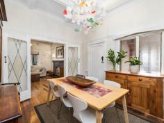 22 Market St, Guildford WA 6055 $830,000 Simply gorgeous (circa 1932) 5 x 2 brick & tile Art Deco home in walking distance to the SWAN RIVER, the Café strip, pubs, restaurants, transport, the exclusive Guildford Grammar School and only minutes from the airport & all the treats on offer in the Swan Valley. Boasting: • High brick wall with electronic gates • Attractive front gardens with timber deck & seating area • Wide veranda – that perfect spot to relax • Impressive entrance with attractive Art Deco wall lights • Formal lounge with fireplace, ornate ceiling, stunning lead light window, French doors & Art Deco light fixtures • Dining room with ornate panelled ceiling, unique light fitting & lead light French doors • The timber kitchen is the hub of the home and has fitted cupboards to the ceiling, good bench space, stainless stove & dishwasher. • Private Master bedroom at the front with stunning lead light window • Three additional good sized bedrooms • Renovated white bathroom • Separate powder room • Library/Study with fitted bookshelves & lead light window • Spacious Family room with bi-fold doors to the alfresco entertaining area • Laundry and 2nd wc. • Pitched gabled alfresco area with extensive paving • Lush established gardens with veggie troughs • Cubby House & Chook pen • Powered workshop with timber shutter doors • Single garage with shopping entrance – ample off street parking • STUDIO – French doors adorned with timber shutters – sitting room, contemporary bathroom, r/c unit & gas bayonet. Additional features: High ornate ceilings, timber floors, lead light windows & French doors, some Art Deco light fittings, 4 x r/c units, electronic wrought iron gates, lush established auto reticulated gardens. Right of Way at the rear with gate to the back yard. Side access Block size: 886m2 YOUR WAIT IS OVER! FEATURES Split-System Air Conditioning Courtyard Deck Fully Fenced Outdoor Entertainment Area Secure Parking Dishwasher Floorboards Study Workshop
