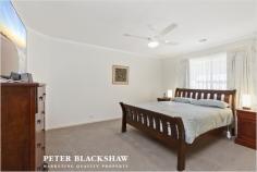 22 Tsoulias St, Gungahlin ACT 2912 $739,000+ Perfectly positioned opposite parkland and only minutes to the Gungahlin Town Centre, Flemington Road, Horse Park Drive and the Light Rail is this 4 bedroom plus ensuite family home. The clever and contemporary floor plan for 22 Tsoulias Street maximises light and space, while kitchen invokes a sense of grandeur and is the heart and soul of the home. It is understated in elegance but does not compromise on functionality, featuring a stainless steel Electrolux oven, Omega induction cooktop and stainless steel Fisher and Paykel double dish drawer. The north facing undercover alfresco is the perfect haven for entertaining large family gatherings and overlooks private and established gardens. Very generous in size is the main bedroom which includes a reverse cycle air conditioner, walk-in robe, ceiling fan and ensuite, while the remaining 3 bedrooms which are generously proportioned also include built-in robes and ceiling fans. Completing this wonderful home is the double garage with remote and internal access and family sized laundry with a built-in storage plus the comfort of ducted gas heating throughout. Conveniently positioned within walking distance to the Gungahlin Town Centre, restaurants, cafes, Gungahlin College, medical centres, public transport and within easy access to Horse Park Drive and the Gungahlin Drive Extension. An inspection of this magnificent home is highly recommended to truly understand the lifestyle on offer. Features: - Block: 470m2 - House: 218.2m2 (Living: 181.17m2 + Garage: 37.03m2) - 4 bedrooms - Main bedroom includes walk-in robe, ensuite, split system, ceiling fan - Built-in robes and ceiling fans to bedrooms 2, 3 & 4 - Main bathroom with spa bath - Separate toilet - Lounge room and dining room - Living area and meals area - Reverse cycle split system to living area - Laundry with access to rear - Ducted vacuum - Ducted heating - Undercover entertaining area - Automatic double garage with internal access
