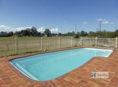 15 Pratt Street, Casino, NSW GET READY FOR SUMMER! Start summer in this home with your very own swimming pool and Colley Park at your back fence. -3 bedrooms built-ins in all, ceilings fans, lounge and dining area. -Tidy kitchen with electric wall oven, bench hot plates and dishwasher. -Central bathroom with separate shower, bath and toilet. -Garage converted into rumpus or 4th bedroom, second toilet in laundry. -Covered outdoor area, carport, garden shed, verandah on two sides. -In ground swimming pool, Fully fenced 951sqm block. Motivated seller, make an offer today. Contact Trent Savins on 0403 624 193 for an inspection.