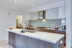 15 Ankuri Rd, Tarneit VIC 3029 $650,000 - $700,000 Proudly presenting this stunning establishment in a prime position with Tarneit Gardens Shopping centre right at your doorstop. Close to Schools, beautiful Parklands, Tarneit Community Centre, and a short drive to the Tarneit Train Station. Comprising of: • Four Bedrooms with Built In Robes. • Master with WIR, full hotel style Ensuite with stone top’s & double vanities • Formal lounge, tiled family meals arrangement, large rumpus room • Separate study and a large open kid’s retreat or 2nd study • Outstanding hostess kitchen with soft close drawers, stone bench tops, glass splashbacks and your own large butler’s pantry complete with a kitchen sink • 900mm stainless steel Blanco up right cooker, Blanco Dishwasher • Ducted heating, evaporative cooling, ducted vacuum • Decorative cornicing, high ceilings, security system, security shutters all 5-star energy rating • The dream tiled alfresco-entertainment area • 6 x 3 garden shed, side access for a boat, caravan or trailer • Double remote garage with internal access To complete this stunning establishment picturesque landscaped gardens and all on approx. 726m2 land. Turn the key kick your feet up and relax and enjoy this amazing family home!