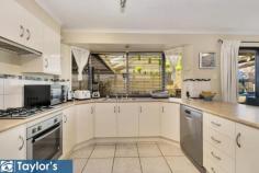 4 Stonewall Pl, Greenwith SA 5125 $550,000-$579,000 This attractively rendered and immaculate, large four-bedroom family home is located in the popular suburb of Greenwith and has been carefully maintained throughout and is situated on an easy to care for low maintenance allotment. The home is set amongst other quality homes and with an extensive list of features and 3 living areas, the property is sure to impress and ticks all the boxes. As you enter the home you are greeted with a neutral decor that flows throughout the home. The first room you come to is the large formal living, which straight away catches the eye, and this leads onto the core of the home that is an impressive and spacious open plan living area that incorporates a well-equipped modern kitchen consisting of stainless steel appliances including gas cooking and a dish washer, ample bench and cupboard space and also a bay window, this overlooks the casual meals/family and games room. 4 bedrooms are ready made for the established family with the master bedroom containing an ensuite and walk-in-robe, the other 3 bedrooms have the convenience of having built -in-robes. The modern 3-way bathroom with separate vanity and linen press, is centrally located to service the bedrooms and living areas. The home is temperature controlled all year round and features, reverse cycle air conditioning, ducted evaporative cooling and gas heating. There is a combination of floor coverings with large hard wearing floor tiles to the open living and main traffic areas, carpet to the bedrooms and formal living area. All your outside entertaining needs are will be taken care of by way of a spacious pitched roof, decked entertaining area which is one of the main features of the home, there is also an adjoining pitched roof paved pergola that doubles as an additional entertaining area and has gated access allowing a 3rd parking area for your boat, trailer etc. A large double carport under the main roof with remote control roller doors to keep your car safe and out of the weather, there is also the convenience of internal access to the home. Features at a glance; • Built by Fairmont Homes in 2002 • 3 living areas • 4 Bedrooms • Master with walk-in-robe and ensuite • Built-in-robes to other 3 bedrooms • Modern kitchen with stainless steel appliances • Large family, meals and games room • Separate formal living area • Main bathroom with a separate vanity • Huge undercover and decked entertaining area • Double carport under main roof with auto roller doors • 3rd undercover paved parking area • Reverse cycle aircon, ducted evaporative cooling, gas heating • Gas hot water • Hard waring floor tiles to main traffic areas • Low maintenance gardens This is a quality offering with great entertaining for family and friends, call now to view…..