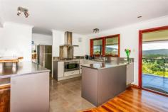34 Hidden Ct, Kingsholme QLD 4208 AUCTION ONSITE Saturday 18th Nov 12:00pm A lot of work has gone into this luxurious 3.2 acre Property, creating space for the kids & pets along with landscaped fruit trees and beautiful natives. Stunning views while you soak in the In ground Spa Timeless hard wood polished floors Lovely combustion fire place Ducted air-conditioning Turn wood timber features 3 water tanks that hold in total 85,000 Litres Huge 3 bay American barn style man cave with 3 phase power that fits 9 cars easily. Call John today or see you at the Open Home.