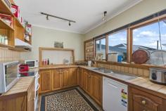 14 O'Brien St, Glenorchy TAS 7010 $349,900 If you are looking for a convenient location with the major shopping centres of Glenorchy & Moonah nearby and situated on a bus route then this may be the home or investment for you and complimented by a massive 817 sq.m block approx. This is a blank canvas opportunity for you to make your personal mark. Comprising of 3/4 great sized bedrooms and supported by a quaint and functional bathroom and this flows to a large sun filled lounge room which is heated by ducted gas. The combined kitchen and dining area is enhanced by direct access to the fully fenced child and pet friendly back yard and under covered entertaining area. The laundry is to the side of the kitchen and is also very spacious. Gas hot water is also a great feature of this family home. To the front of the home is a single garage and workshop. Currently tenanted at 325per week and the tenants wish to stay on if sold to an investor.