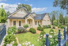 29 Myall Ave, Kensington Gardens SA 5068 Auction Saturday 18th Nov at 11:00 am Superbly built 2002 of solid double brick construction in the classic and timeless Tudor style. Set amongst formal English gardens with an abundance of David Austin roses and native birdlife, including visits from ducks and the occasional koala. Fine attention to detail with wide entrance hallway and central arch, leadlight double doors, coved cornices, high ceilings, quality lighting and drapes. Sitting room with fire surround and electric log fire creates a beautiful ambience. Main bedroom with 2 walls of built-ins, 2-way ensuite bathroom with heating and the 3 other bedrooms also have built-in storage. The 3rd bedroom, 2nd bathroom and a separate toilet is the perfect private retreat for guests. The well appointed Alby Turner kitchen has Imperial Granite benchtops. Miele and Kleenmaid appliances with ample storage. Adjacent to the kitchen is the North facing dining space with sliding doors to the wide tiled pergola for year round alfresco entertaining. The family room also enjoys the beautiful outlook to the well established peaceful private garden. The large double garage has a good sized work/storage area and remote roller doors. Automatic gates access the property and extra space for 2 vehicles. Many extras include ducted r/c a/c, solar hot water system, monitored security and auto watering system for both landscaped gardens. This highly sought after location is a short walk to the Kensington Road shopping precinct, Kensington Gardens Reserve and Kindergarten, plus it’s close to public transport and many fine schools including Pembroke, St Peters Girls and Burnside Primary. Council Rates $2313.40pa ES Levy $534.80pa SA Water $324.85pq