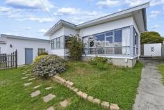 14 O'Brien St, Glenorchy TAS 7010 $349,900 If you are looking for a convenient location with the major shopping centres of Glenorchy & Moonah nearby and situated on a bus route then this may be the home or investment for you and complimented by a massive 817 sq.m block approx. This is a blank canvas opportunity for you to make your personal mark. Comprising of 3/4 great sized bedrooms and supported by a quaint and functional bathroom and this flows to a large sun filled lounge room which is heated by ducted gas. The combined kitchen and dining area is enhanced by direct access to the fully fenced child and pet friendly back yard and under covered entertaining area. The laundry is to the side of the kitchen and is also very spacious. Gas hot water is also a great feature of this family home. To the front of the home is a single garage and workshop. Currently tenanted at 325per week and the tenants wish to stay on if sold to an investor.