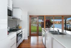 67 Wyuna Rd, Tweed Heads West NSW 2485 $795,000 -$825,000 OPEN TO INSPECT SATURDAY 11TH NOVEMBER 9:30 - 10:00AM NSW TIME Hidden down a long private drive, you will land on shore at this trendy (4) bedroom low set contemporary residence aloft a 885m2 absolute waterfront allotment. KEY FEATURES: - Open plan air-conditioned living w/ cool timber flooring - Master bedroom w/ ensuite - Sociable hostess kitchen w/ island bench, cml size oven w/ gas hot plates - Bi-fold doors, plenty of glass & louvers - Large covered entertainers deck overlooking the water - Double carport & storage DETAILS: Rates - $3,082.05 per annum Water Rates - $TBA Market Rent - $650 per week LOCATION: Your new waterfront abode is located on the fringe of Kirra and therefore you can enjoy the benefits of local cafes and major shopping at a moment's notice. For beach lovers and surfers, you can have your toes in the sand at Kirra, Snapper & Greenmount (to name just a few) within (7) minutes. AGENT'S COMMENTS: A delightful home with a real personality that comes to life as soon as you walk through the front door. If you are looking for a property with a difference then this is it. * Please note the boat ramp belongs to your neighbour '
