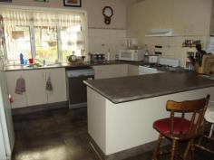 30 Roessler Ave, Applethorpe QLD 4378 $380,000 Only 5 mins north of Stanthorpe in the township of Applethorpe is this character-filled 5 bedroom home plus 2 additional granny flat dwellings on a picturesque 3 acre block. The main home features a front patio, large formal lounge with reverse cycle air con, a well-appointed kitchen and dining area, bathroom plus second separate toilet, outdoor laundry and covered bbq area with spa, uncovered entertainment area looking over the fenced yard area suitable for young children and small pets, 4 built-in bedrooms off the family room with wood heating and access to the rear undercover area, and a spacious master bedroom with built-ins off the formal lounge. The additional dwellings each contains a kitchen and bedroom/living area and shared amenities, and is ideal for renting out and providing a supplementary income with little fuss. Plenty of car accommodation, storage space and workshops, as well as bore water to keep the lawns and gardens looking good all year round. This property has many facets and would make a very suitable family home as well as a B&B opportunity, so contact Simon Leigh on 0418 790 070 to make an appointment.