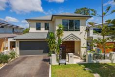 4 Port Peyra Cres, Varsity Lakes QLD 4227 Perfectly positioned in one of Azzurra Islands finest streets sits this large 45 square contemporary home with parkland and water views at your back door. Main features include: • Stunning master suite featuring ensuite with dual vanities, walk-in dressing room, parents retreat and balcony with views • Large double bedrooms • Quality kitchen with stone benchtops, stainless steel appliances and double draw dishwasher • Downstairs living area opening onto a covered alfresco • Second living area upstairs • Ducted air conditioning plus extra split systems throughout • Solar power • Vacumaid • Alarm System Varsity Lakes is a leading master planned community located at the heart of the Gold Coast. Offering a diverse range of living options, highly detailed open spaces, diverse working opportunities with a strong IT infrastructure and a high quality of education offerings. Varsity Lakes is a cosmopolitan lakeside community, a place for people to relax, play, learn and enjoy a real sense of belonging. Amenities, shopping and transport are easily accessible from Varsity Lakes including, Varsity Train Station, Robina Town Centre, Bond University, Varsity College, Lake Orr and the M1.