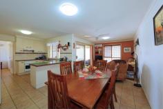 72 Leivesley St, Bundaberg East QLD 4670 $335,000 The perfect package for the downsizing family or retiree with extra bedrooms for guests or craft and certainly no compromise on shed space for the extras. Well known for being a lovely, quiet part of town, Kalgarra Estate is the perfect spot to make home. A Kleidon home, this home is neat and complete and ready for its new owners: Double garage with extra length on one side which has benches and shelving for a workshop and a separate air-conditioned office on the other side. Ideal for a home business/studio. In behind this area, there is another storage space again with roller door to the side. Secured behind double gates, is the patio area and carport, all concreted for easy manoeuvering and storage of vehicles. Two separate living areas, a formal lounge at the entry which flows through to the main open living area. Both rooms are air-conditioned. Neat kitchen with a servery to the patio, good size pantry, large double fridge space and a breakfast bar. Appliances include a dishwasher Four bedrooms in total, all with built in robes – two bedrooms have tiled floors. The Master bedroom is air-conditioned and has access to the two way bathroom. One of the other bedrooms is also air-conditioned Large main bathroom with shower and bath, separate toilet Second toilet off the laundry area Security screens and window coverings throughout A lovely home with great storage space, easy maintenance and in a fantastic location that is always highly sought after. Particularly at this time of year, you can appreciate the family friendly neighbourhood with so many homes getting into the festive spirit. The owners have purchased elsewhere so do not hesitate in making this property your new home today!