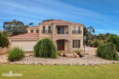 2 Aurina Drive Hidden Valley VIC 3756 $750,000 - $800,000 Positioned opposite the Hidden Valley Golf Course, this house has some of the best views in the area. With four large bedrooms, master with full ensuite and spa bath and dual WIRs, second also with ensuite and WIR and 3rd and 4th with WIRs this house has that extra touch of luxury. The formal lounge and dining is complemented by the modern and fresh kitchen and adjoining theatre room, living area and under-roof inside/outside alfresco area. The beautiful solid timber staircase leads up to the four spacious bedrooms and an extra family/TV area. A good sized study, and large laundry with a huge linen press, under stair storage, ducted vacuum, and solar panels, all add to this house which is a credit to the current owners and is kept in beautiful condition. This large 1000m2 block means there is ample room for caravans or for entertainment or for the kids to play.