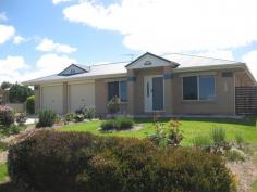 6 Torrisi Terrace, Stanthorpe QLD 4380 $375,000 In a sought after residential area of Stanthorpe amid other quality residences is this low set brick home just 12 years old and in immaculate condition. It offers 4 bedrooms ( or 4th study) all built in, main with ensuite and walk in robe. There is a separate lounge and an open plan casual living/dining with a wood heater plus an effective 4.5kw air conditioner. The adjoining electric kitchen with dishwasher has direct access to the double garage with remote control doors. Property has full security screens too and 3kw/350 litres solar hot water. The main bathroom has sep bath, sep shower, sep toilet and the nearby laundry has direct rear access. There is a delightful private N/E facing under cover casual area - ideal for all year use PLUS a separate covered BBQ area which is also great for a family area/hobby space or just a get a way! Near this is another L/U garage for vehicle/mower/trailer/ workshop etc. There are 2 tanks, 2 pumps PLUS all town services and the property is fully fenced (colorbond) and has most attractive established gardens set on easy care generous 997m2. Nothing to do ....property and position are excellent....an ideal quality residence to appreciate NOW. Asking $375,000. Call Anne Lindsay on 0418 737309.