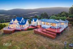 70 Gumpits Rd, Birchs Bay TAS 7162 $995,000 This amazing property is positioned to enjoy the most spectacular views one can imagine of the D'Entrecasteaux Channel, beautiful Bruny Island and far beyond. This property with its multiple dwellings lends itself to those who want to derive an income from home or perhaps accommodate a parent or teenagers and will surely appeal to those with an enterprise or a vision. Made up of 25 acres, there are various cleared sites which would be ideal for developing further accommodation and a great ecotourism business (STCA). The main residence has beautiful destressed Tasmanian Oak floorboards, and the stunning kitchen boasts a dishwasher, gas cooker, fabulous concrete bench tops and a large pantry. This area flows easily to the open plan living and dining space which enjoys simply breathtaking water views through expansive double-glazed windows. The home is very well insulated and is kept warm with a wonderful wood heater. Additional to the bedroom, home office and modern bathroom in the main area, there is a second living area, further bedroom and toilet accessed just off of the deck offering some separation, ideal as guest quarters. The Storybook cottage is as pretty as a picture and offers plenty of space, two great sized bedrooms, a balcony and an office or nursery upstairs plus a lovely modern kitchen, bathroom with spa bath and open plan living which extends onto more of the linked entertaining deck. The farm shed is sensational, and offers practicality with a loading dock, however there is so much more opportunity here, with such a large space and incredible view, one can easily imagine a venue or cellar door and the property already boasts a vineyard, albeit in need of reviving but the infrastructure is here already! There are three dams on the property, seven water tanks, solar hot water and power, NBN, a fantastic chook house, enclosed veggie garden, a winter creek, extensive new fencing, beautiful natural bush, landscaped house gardens and much more. Grandvewe Cheesery, Hartshorn Distillery and various wineries are close attractions to the area. The pretty village of Woodbridge is only a stone's throw away, offering a general store, post office, renown Peppermint Bay, a tremendous district school, boat ramp & jetty and a community that is a real pleasure to belong to, here in Birchs Bay, an amazing lifestyle awaits you and the potential of this property is limited only by one's imagination. Call Chenoa today to arrange a private viewing!