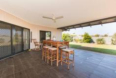 3 Hussen Way, Bilingurr, WA 6725 3 Hussen Way, Bilingurr, WA 6725 - House for Sale - If you're looking for a home as beautiful as Broome itself, look no further - you'll find it right here in this perfectly designed three bedroom, two bath family home. Built in 2013, the executive residence with exclusive design mixes modern styling with practical living - not to mention stunning features including tiled flooring, stone benchtops throughout with contemporary and stylish finishes. As you enter the home via the tiled portico, bright, open and inviting are just some of the words to describe the interior. Fully air-conditioned throughout, it's a dream for lovers of clean, up-to-the-minute design. Spacious, open plan living and dining areas open into one of the main features of the home - the stylish kitchen, boasting island breakfast bar, gas cooktop and stainless steel appliances. To the front of the home you'll find the large, main bedroom with private ensuite and walk in robe. There are two more bedrooms - all with built in robes and air conditioning. There's a large main bathroom plus a huge laundry with storage and bench space galore. Designed to maximize both indoor and outdoor living, double banked sliding glass doors allow abundant amounts of natural light into the home whilst also providing easy access between the interior and exterior living areas. As you step outside, you walk onto the undercover, tiled entertaining area and manicured gardens. Beautifully designed, the space is simply stunning.