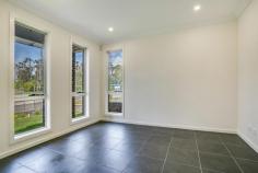 36 Hebe Terrace Glenfield NSW 2167 $829,999 Perfectly positioned in the ever growing and sought-after suburb of Glenfield is this brand new family home. It is sure to impress with its intelligent design and high end inclusions. Set on a good sized block with features that include: • Master bedroom with walk-in & ensuite • 3 bedrooms all with built-ins • Formal Lounge • Modern kitchen with stone benchtops and stainless steel appliances • Combined dining and family room • High 9ft ceilings • Tiled downstairs and carpeted upstairs • LED lighting throughout • NBN ready • Modern bathroom tiles to ceiling • Ducted reverse cycle air conditioning • Large undercover outdoor entertaining area • Remote lock up garage This property has too many features to mention and is in close proximity to a host of all amenities including Crossroads Homemaker Centre, M5 motorway, Glenfield Station and local schools. Call ONE AGENCY CARNES HILL for your inspection.