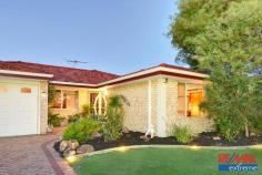 32 Combewood Loop, Carramar WA 6031 $520,000 Fashioned with a true sense of style, this wonderful family home offers both comfort and luxury right from welcoming entry where you are greeted by a sense of style and space that entices you into the home. From the moment you enter, you will be impressed with the sophisticated design, functional living areas and space afforded to the entire family. The kitchen and expansive living areas radiate a sense of warmth and openness that inspires and invites. Catering for any gourmet chef, the kitchen features generous storage spaces, quality appliances and delightful views to the front and alfresco entertaining zone. One of the true highlights of this home is the outdoor covered alfresco that is fully protected from the elements including the harsh summer sun. The space is ideal for year round entertaining or a weekend of relaxing. With perfect positioning in this popular northern suburb, the residence is located just a short stroll to Carramar Primary School and Shopping Centre. Features: â?¢ Master with walk-in Robe & ensuite â?¢ Bed 2 â?? Double size with semi walk-in Robe â?¢ Beds 3 & 4 â?? Single Robes â?¢ Study Nook â?¢ Huge Theatre/Media Room â?¢ Reverse Cycle Air-conditioning â?? Kitchen/Living/Dining Areas â?¢ Split Reverse Cycle Air-conditioning â?? Master Suite â?¢ Ceiling Fans â?? All bedrooms, Living Room ad Media Room â?¢ Security Alarm System â?¢ 2 x Gas Points Outside â?¢ Council approved Pergola â?¢ Fully reticulated front and rear yards â?¢ Walking distance to Carramar Primary School and Shopping Centre