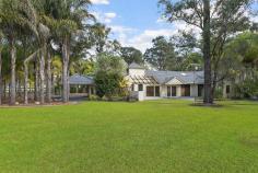 25 Tadmore Rd, Cranebrook NSW 2749 INSPECTION TIMES Saturday 24th February 02:00am - 02:30am When only the best will do..... This majestic property on five level flood-free acres with town water is graced with two contemporary homes (dual occupancy approved) in a very private location in the exclusive suburb of Cranebrook. The main residence is a 4 bedroom architect-designed resort-style home with a grand, palm-tree avenue entrance and is surrounded by stunning tropical gardens and lawns, sealed pathways and a circular drive. The entire home is filled with natural light thanks to the multiple sky lights, glass sliding doors and large windows, enhanced by ultra-modern timber plantation shutters and venetians. With large open-plan living areas and quality tiled floors throughout, it has the bonus of being designed to facilitate wheelchair access, and the needs of the elderly. There is also ducted air and vacuum, and multiple individual air-conditioning units to ensure climate control all year round. The spacious eat-in kitchen/dining area features a large breakfast bar, walk-in pantry, granite benchtops and splashbacks, and is complemented by ILVE gas cooktop and 900mm oven. Large lounge and living areas are highlighted by soaring raked ceilings with skylights, and a large slow combustion fireplace. The Master bedroom is enormous, with a huge walk-in robe and ensuite. The remaining bedrooms also have built-in robes, and the bathroom is beautifully renovated with high-end fittings. In the landscaped property grounds, you will also find an 8m x 7m (approx) drive-through double garage with auto doors, and drive-through carport. And of course, a property of this calibre is fully alarmed with video security, remote-access electric gates, and intercom. The council-approved second dwelling has its own sealed driveway and entrance, plus a double carport. Featuring 3 large bedrooms, fully renovated bathroom, and split-cycle air conditioning, this home is immaculately maintained, and can potentially provide you with an additional income stream, or be utilised for extended families or guest accommodation. This exemplary property is ideally sited in a prestige, very quiet location in Cranebrook, close to St Paul's Grammar and yet just 5 minutes to Penrith. Call Michael now to arrange your private inspection.
