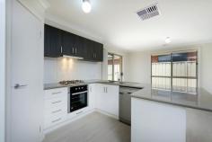 3 Muster Ct Thurgoona NSW 2640 $389,000 Located in a quiet court of a prestigious Thurgoona estate and surrounded by quality homes, this brand new Hotondo Home is set on 500m2 with views of the golf course from the front yard. Tastefully decorated in neutral colours, this home comprises 3 double bedrooms, main with walk in robe and ensuite and built-in robes to the remainder. Featuring a modern kitchen with gas cooktop, dishwasher and pantry adjoining the open plan family room and meals area. The main bathroom with shower, bath and separate toilet are central to the 2nd and 3rd bedrooms as well as the laundry with linen cupboard. Entertaining areas are completed by a formal front lounge and open air alfresco while year round comfort is provided by ducted cooling and heating throughout. Additional features include remote double lock-up garage with internal access, easy maintenance landscaped gardens and fully fenced backyard, side access with secure parking for boat/caravan or shed, 2700L water tank plus additional parking space large enough to accommodate a truck. Inspection will impress! Disclaimer: All care has been taken in compiling these particulars, but the vendor and their agents do not guarantee the details and cannot accept responsibility for errors or misdescriptions if any. Intending purchasers should satisfy themselves as to the correctness of details.
