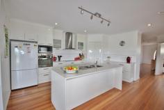 20 Trumpeter Ave, Eden NSW 2551 $668,000 Enjoy coastal living at its finest in this superbly presented 3 bedroom contemporary home, boasting beautiful ocean, bay and coastal views sweeping over Eden to the mountains. Featuring an enormous open plan living area which flows from the generous entry foyer through to the lounge & dining areas and then out through two large stacker sliding doors to extensive undercover alfresco desk areas. There is a separate theater room off the main living area. Fully equipped modern kitchen with large pantry, caesar stone bench tops & breaky bar and quality appliances. The generous master bedroom has a walk-in-robe and luxurious en-suite with separate bath & shower & WC. The 2nd bedroom is also large and has a walk-in-robe and also opens out onto the deck. The 3rd has built-ins. Quality main bathroom with separate WC. Plus there is a study nook. Double remote garage with internal access and downstairs is an enormous workshop/rumpus area which has potential for further bedrooms or possibly a flat. Positioned on a gently sloping 1,260m2 fully fenced block. The property is just a short walk from the foreshore reserve to Lake Curalo and Aslings Beach.