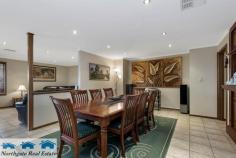 14 St Vincent St, Gulfview Heights SA 5096 $630,000 - $650,000 One of the most amazing and meticulous properties you are likely to see is now available in the prestige area of Gulfview Heights. Located in the dress circle of the hills face this superb home is unique both in its design and layout. Originally specifically designed as a one off by the original owners you will be the next unique owners of this magnificent entertainer. With emphasis on quality timberwork and cabinetry this one really stands out as good as a display home. Features include a double garage with drive through access as well as personal access into the home, a huge undercover patio veranda area that can easily accommodate the whole family and friends on those special occasions. Gardens to the front and back look like they are straight of a house and garden magazine. Stunningly beautiful perfectly manicured and very low maintenance indeed. The hub of the home is the solid timber kitchen that overlooks both the internal and external entertaining areas. A dishwasher, huge bench spaces, and a pantry means you can cook a feast for for a king here with ease. The formal dining room easily seats 10 people and is adjacent to the magnificent built in bar and bar room, in fact you would be forgiven for thinking you are in one of Adelaide’s elite bars, but inside your own home. A formal lounge room offers comfortable TV viewing or relaxing after a hard day’s work. Three very generous bedrooms, an exquisite en-suite to the master as well as a walk-in robe, store room and parents retreat come home private office is a real eye opener. The second and third are beautifully laid out with built in robes as well. The attention to detail in the build quality, the timberwork, the outdoor verandas and gardens will truly amaze even the most fastidious and discerning buyers. This is an absolute work of art for a family home and one to be proud to own. Ducted air-conditioning, quality soft furnishings and carpet/tiling again will please any tastes in décor and furniture. Room for the whole family to enjoy and grow, the discerning executive business couple or even the retirees wanting style, quality, and low maintenance.