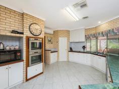 54 Tambulan Rd, Maida Vale WA 6057 $849,000-$899,000 The home was designed with entertaining in mind and offers a wonderful sense of space throughout the entire home especially the multiple living areas. The kitchen is central hub of the home and one of the highest traffic areas, with plenty bench and storage space, two wall ovens large pantry and dishwasher it is up to the task of withstanding the busiest of families. The lofty ceiling height through this open plan area consisting of family and meals and extends to a games room which also features a built in bar. These high ceilings also feature in the massive alfresco area which extends to almost the entire length of the home. Caf shade blinds can be rolled down to keep the elements at bay and make this the perfect entertaining area through all the seasons, regardless of how lengthy the guest list is. The formal lounge and dining although spacious provide a more private space. The entire home has reverse cycle air conditioning and cooling through the entire home, each member of the family can be comfortable all year around. This 5 bedroom 2 bathroom spacious home will suit the largest of families. The master bedroom and ensuite are located to the front of home and are both extremely spacious. Mum and dad have both been considered in this design with separate his and her walk in wardrobes and vanities. The four minor bedrooms are all double in size with, 2 have double wardrobes and 2 have walk in wardrobes. The amazing property sits on a massive 1801sqm; there are manicured gardens and a large grassed area perfect for tiring out children and pets, together with a garden shed, Hills Hoist and ample room to park all of the toys including boat, caravan and numerous cars. Another fantastic feature of this home is a brick powered workshop attached to the garage. This space has the potential to be used for a number of different activities depending on your individual needs. Perhaps a home office, art studio, granny flat, teenage retreat or even a home gym! If you have been searching for a large family home, great sized bedrooms on a big block in a great location then you have to come and view 54 Tambulan Road Maida Vale. BLOCK SIZE: 1801sqm AGE: 18 Years Old CONSTRUCTION: Brick and Tile INTERNAL FEATURES: 5 Bedrooms 2 Bathroom Home Formal Lounge and Dining Massive Kitchen, Meals & Family Room Games Room with Built in Bar Ducted Evap & Split System R/C A/C Ducted Gas Heating Extra High Ceilings Brick Powered Workshop Alfresco Entertaining Heaps of Parking Double Garage Reticulated Gardens Built in 1999, on a 1801 Sqm Block Features Air Conditioning Built-In Wardrobes Close To Schools Close To Shops Garden Secure Parking Formal Lounge