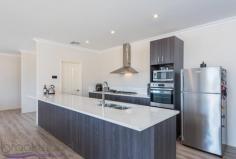25 Peaceful Ln, Gidgegannup WA 6083 $699,000 Property Details Block Size 5 acres Zoning Rural Res Shire Rates $2,325 Description You can’t help but wonder why you would want to build when you can skip past all the stress and go straight to enjoying your brand new home. Built in 2016, this 4 bedroom 2 bathroom Redink home is superbly spacious with 3 separate living areas and large bedrooms to accommodate a growing family. Nestled on a 5-acre parkland cleared and pasture battle axe block, a fantastic semi-rural lifestyle awaits you in this friendly neighbourhood. 4 bedrooms 2 bathrooms 2016 Redink family home Expansive open plan living Deluxe theatre + activity Huge master w/ WIR + ens Large jnr bedrooms w/ BIR Gently elevated alfresco Parkland cleared + pasture 5-ac battle axe, rural view Friendly community locn Tucked away behind parkland timber, this battle-axe property is set in a rural pocket that is convenient for day-to-day life. A portico extends from the front of the home, welcoming you into the wide entry. The master suite is set to your right, offering sought-after separation from both the junior wing and living hub. The expansive space features a beautiful rural outlook, large walk-in robe and open ensuite. The ensuite is finished with dark décor and suggests sophistication and indulgence with double vanities, a double shower, large bath and separate wc. From the main entry, timber look flooring and high ceilings continue throughout the home, as does ducted reverse cycle air conditioning for optimal comfort all year round. Double doors open into the home theatre that offers itself as your new go-to spot for watching the latest releases. The hallway opens to unveil the spacious open plan living hub in the heart of the home. A long breakfast bar connects the kitchen to the lounge and dining whilst creating a convivial spot for casual meals and chit-chat when entertaining family and friends. Complete with a full suite of stainless steel appliances that include a 5-burner gas cooktop, wall-mounted electric oven, grill and dishwasher, it also boasts a huge walk-in pantry and handy IT recess. Sliding doors continue to the adjoining entertaining alfresco. Gently elevated over the rural vista and pasture beyond, this is a fantastic space for casual BBQ dinners or celebrations with friends and family. Glow in the dark quartz in the exposed aggregate concrete creates an otherworldly atmosphere at night. The junior wing offers fantastic separation for growing families, plus a third living area with a versatile activity space that could be used for kids to play, teens to study or young adults to retreat to. The three junior bedrooms are each a large queen size with mirrored built-in robes, making them rival some modern masters. The 5-acre property is part parkland clear and part pasture and offers itself as a blank canvas for your future vision. With plenty of room for livestock, a big shed or pool, you can establish it however you see fit! Set in the premium location of West Gidgegannup, this fantastic family home is in a friendly semi-rural neighbourhood. It’s an easy drive into the bustling Midland CBD and short commute to the endless delights of the Swan Valley for fun come the weekend. To arrange an inspection of this property or for friendly and honest assistance with any of your real estate needs call Mr Happy – Ross Webster – 0407 387 004.